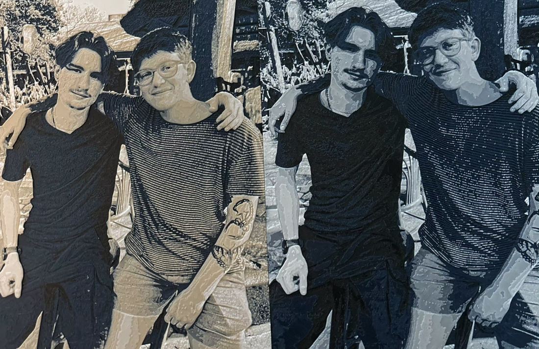 The same photo of two friends printed twice, once in tan, navy and black, once in slate blue, navy and black